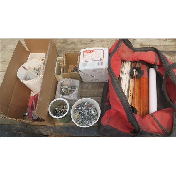 assorted hardware in milwaukee bag - screws, nuts, bolts, etc.