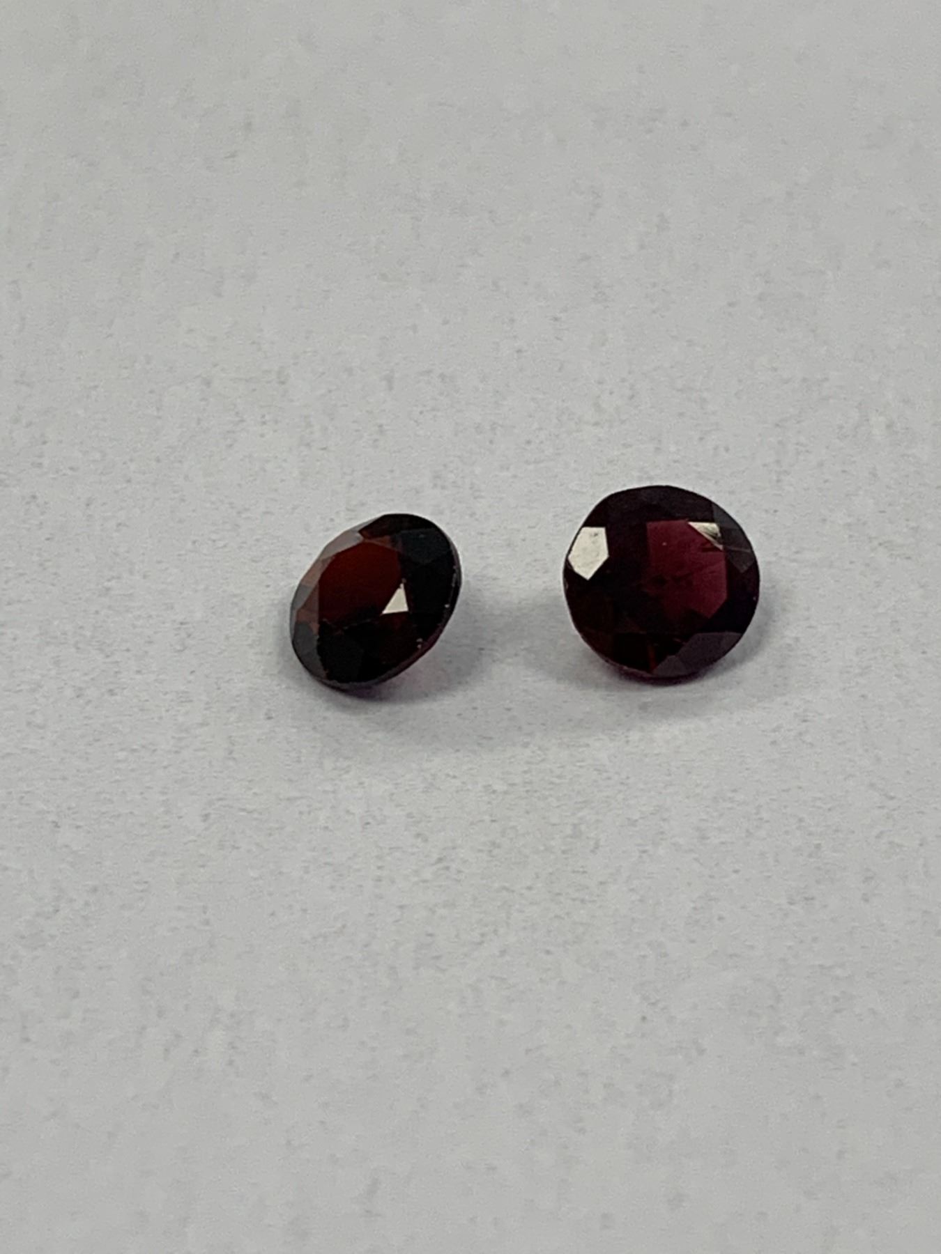 PAIR OF ROUND GARNETS 2.60CT - Able Auctions