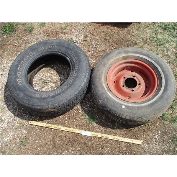(2) Used Tires (One with Rim - P215-75R14)