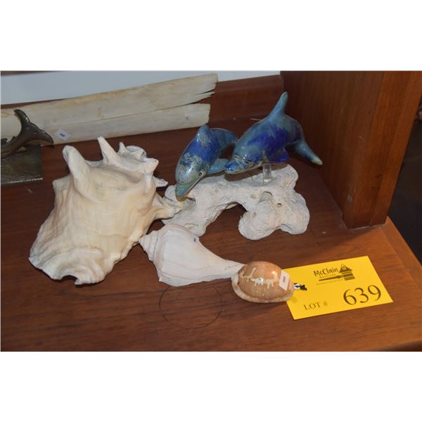 COLLECTION OF SHELLS & STONE DOLPHINS ON CORAL