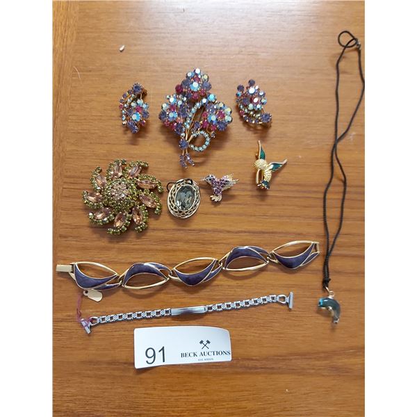 Assortment Of Broches, Clip-on Earrings, And Bracelets