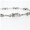 Image 5 : New 14K White Gold 7" .33 ctw Bezel Set Diamond & Figure "X" Link Tennis Bracele