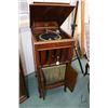 Image 1 : Antique 1/4 cut oak Columbia grafonola with automatic album selector and some accessories. Turn tabl
