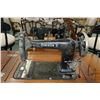 Image 2 : Dominion treadle sewing machine in rare 1/4" cut oak, mission style cabinet.