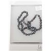 Image 1 : Black pearl necklace 21" in length and a pair of co-ordination earrings