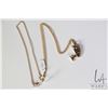 Image 1 : 18kt yellow gold neck chain 27" and a tested and unmarked 10kt yellow gold Nefertiti pendant