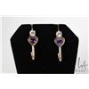 Image 1 : Pair of 14kt yellow gold earrings set with heart shaped amethyst gemstones and clear accent stones