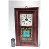 Image 1 : Antique wood cased clock with chiming movement, original litho glass panel, original label, missing 