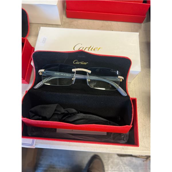 2 PAIRS OF CARTIER SUNGLASSES (AUTHENTICITY UNKNOWN)