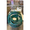 Image 1 : 3 JUGS OF DECK CLEANERS AND LOT OF GARDEN HOSES