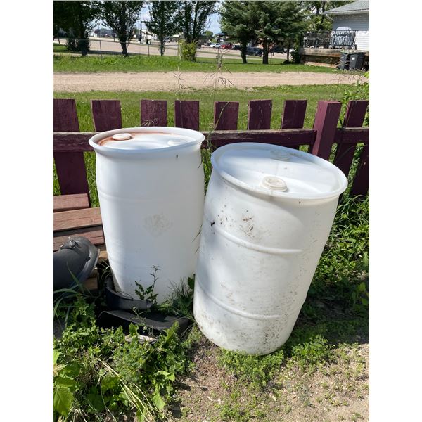 Four White Rain Barrels