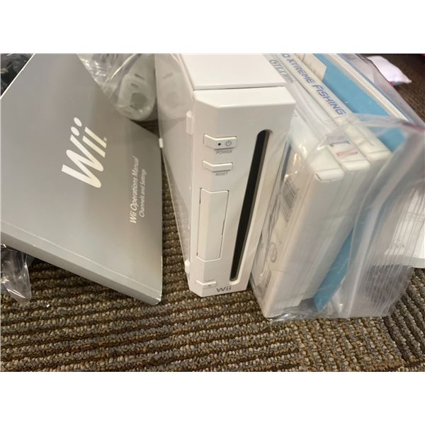 Wii System with games and everything shown in photo