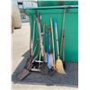 Image 1 : Garden tool lot and brooms