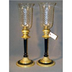PAIR OF BRASS CANDLESTICKS WITH CUT GLASS SHADES