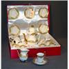 Image 1 : CASED GILT DECORATED PORCELAIN DEMITASSE SET