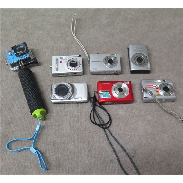Qty 7 Cameras: Optio E10, Canon, Kodak, Samsung, Casio, SJCam w/ Stick