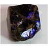Image 1 : HUGE 771.5 CT PURPLE FIRE AMMOLITE