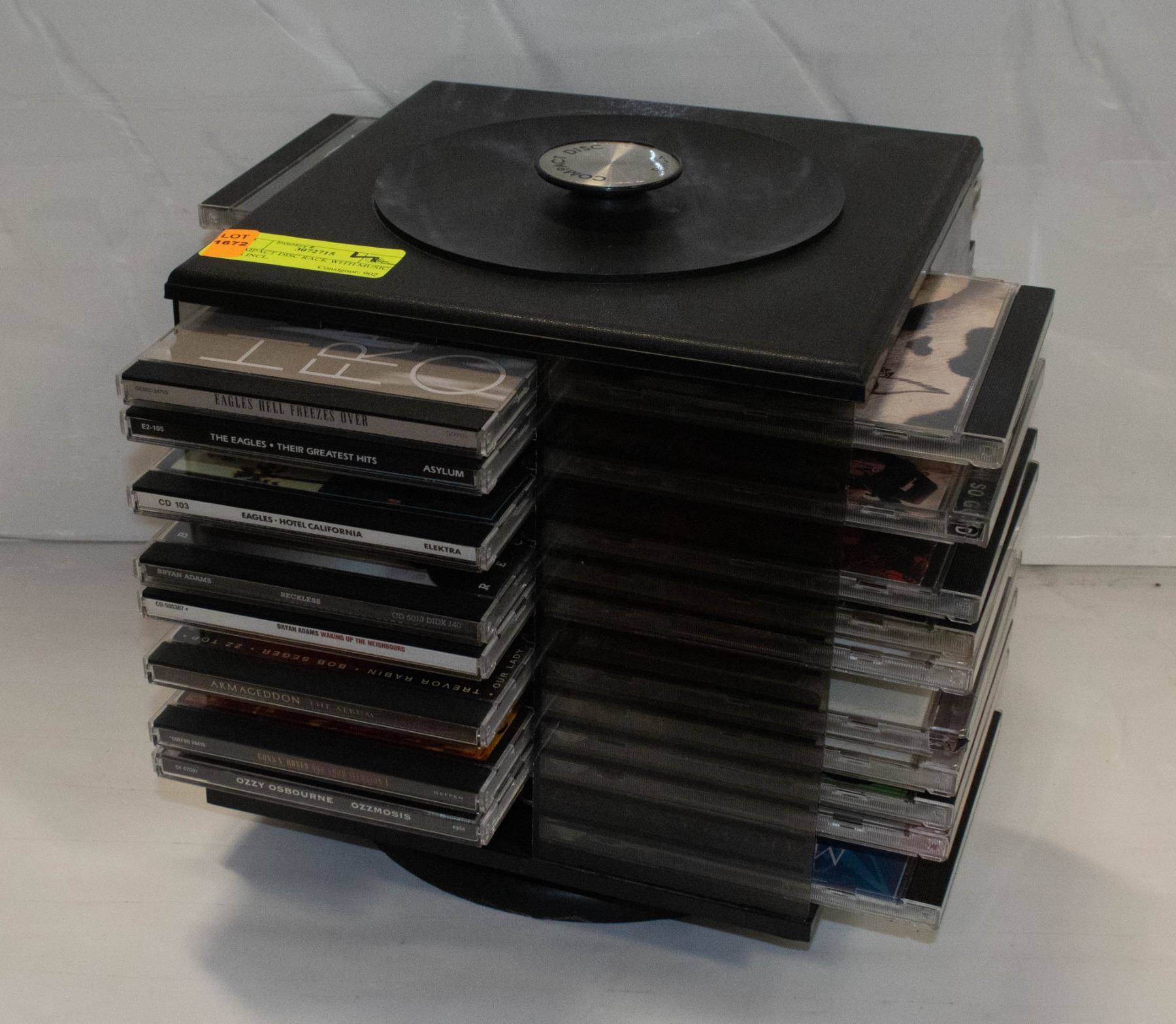 COMPACT DISC RACK WITH MUSIC CDS INCL.