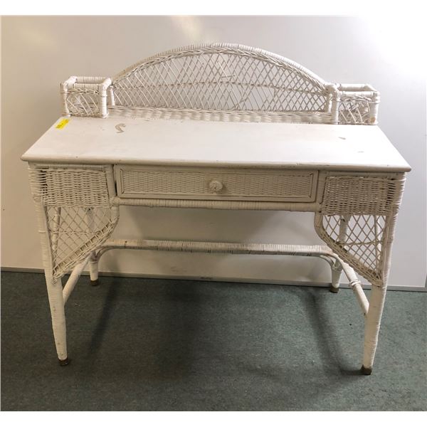 White rattan desk 41in W 21 D 30in H