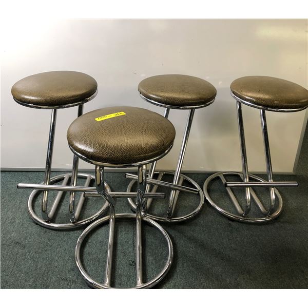 Set of 4 circa 1960's counter stools w/foot rails 25in H