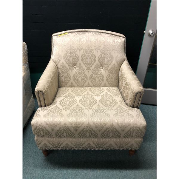 Studded fabric oversized armchair