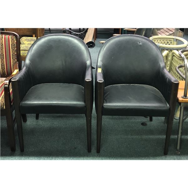 Pair of vinyl barrel chairs
