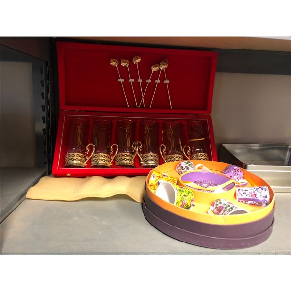 Lot of cased glasses w/gold bottom, gold plated spoons, colourful tea set & spoons