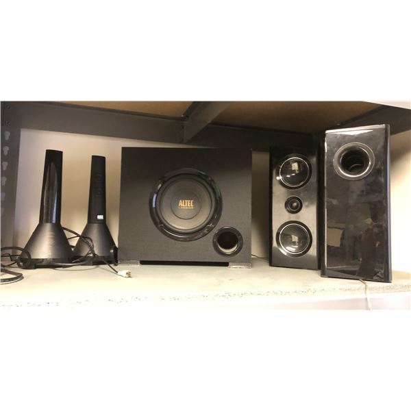 Lot of computer speaker Altec base, remotes, right & left speakers, misc speakers