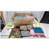 Image 1 : Box of linens - Sheet sets, place mats, throw blankets, etc.