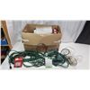 Image 1 : Box of Christmas lights, heavy duty extension cords, plastic hooks, etc.