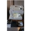 Image 1 : Singer 5810C sewing machine with pedal, manual and accessories