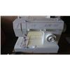 Image 2 : Singer 5810C sewing machine with pedal, manual and accessories