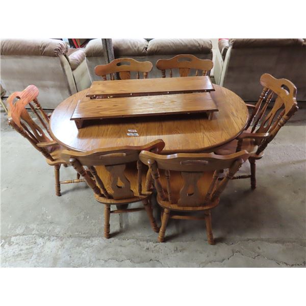 Solid wood table & Chairs with 2 10" leaves & 6 Chairs - Kings & Queens chairs