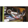 Image 2 : assorted office supplies - rulers, hole punches, paper clips, calculators, etc.