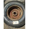 Image 3 : one unused wild country 235/75r15 tire on rim