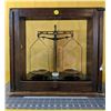 Image 1 : Antique scales, 1930s, in glass and wood case. Works. Glass case 18 in x 18 in.