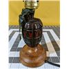 Image 3 : Tasteful, hand grenade lamp with base (The light) works. No shade.