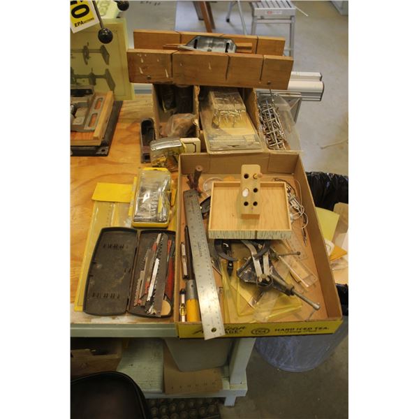 Corner clamps, ruler, pencil holder, sawzall blades, jig homemade for 45° cuts, peg board access., e