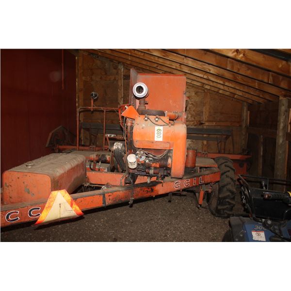 CCIL swather. Has been parked for years, may run.