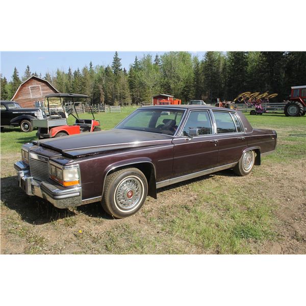Approx. 1987 Cadillac Brougham, vinyl roof, full load velour interior, burgundy color, 4 door sedan,