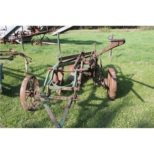 3 bottom plow on steel, appears complete