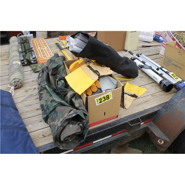Box of gloves and camping gear
