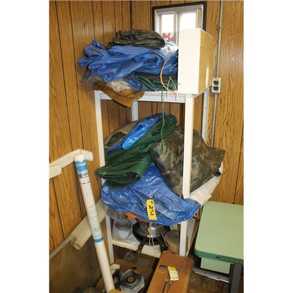 Counter c/w qty of tarps, pans and suitcases