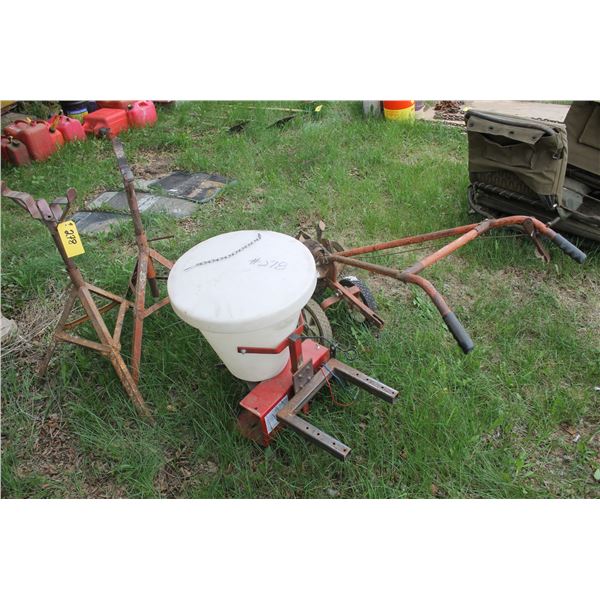 2- stands, 12V spreader and part of a rototiller