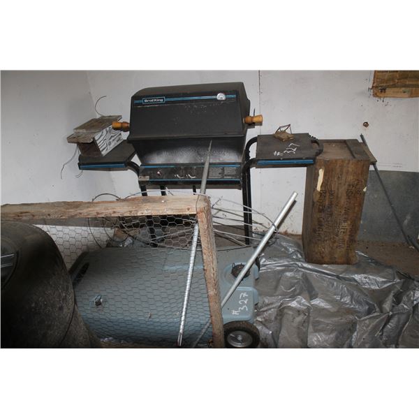 Old BBQ, blue tank, planters, garden fence, wood bench