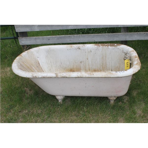 Old four legged bath tub