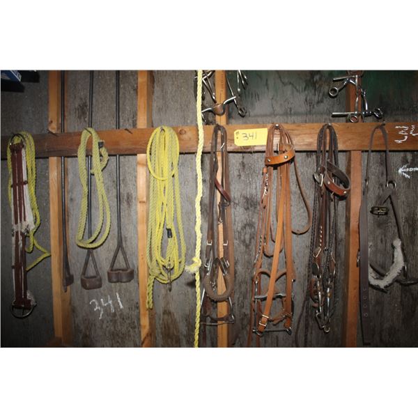 Various bridles, halters, bits, rope and iron