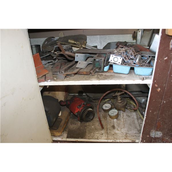 Contents underneath North side of brown cupboard