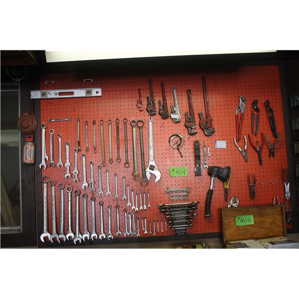Contents on peg board- Wrenches, pliers, pipe wrenches etc.
