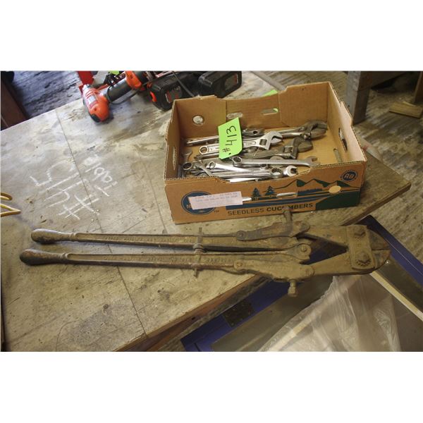 Box of tools, crescent wrenches and old bolt cutter